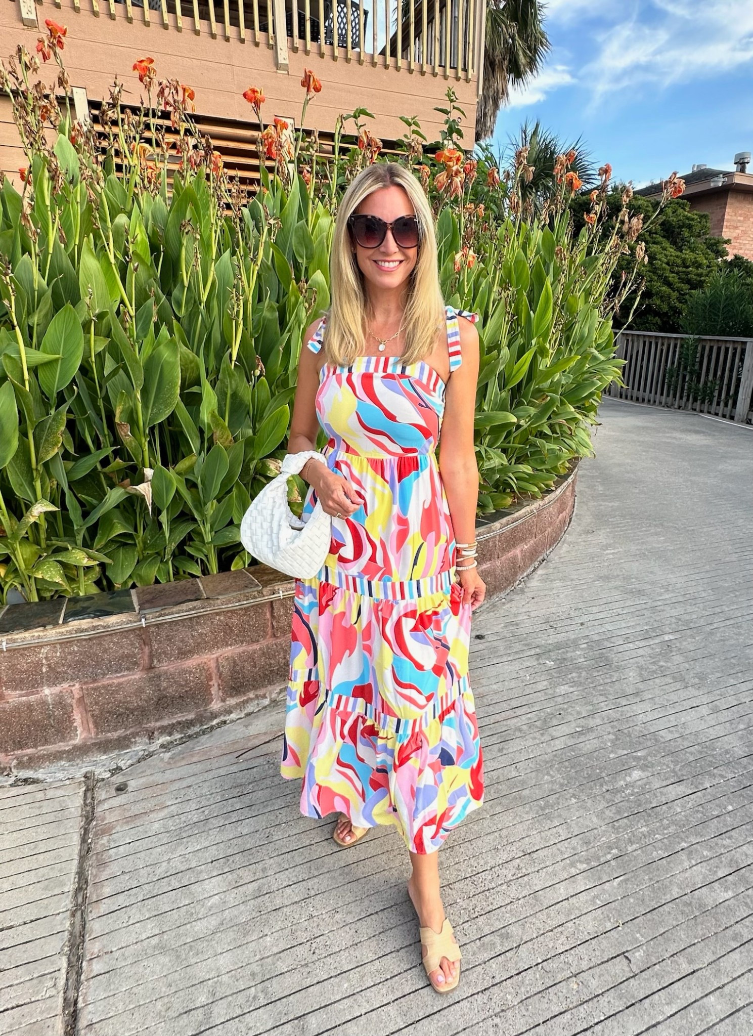 Colorful midi dress for the summer. Perfect for vacation or date night  

#LTKSummerEdit #LTKFindsUnder50 #LTKStyleTip
