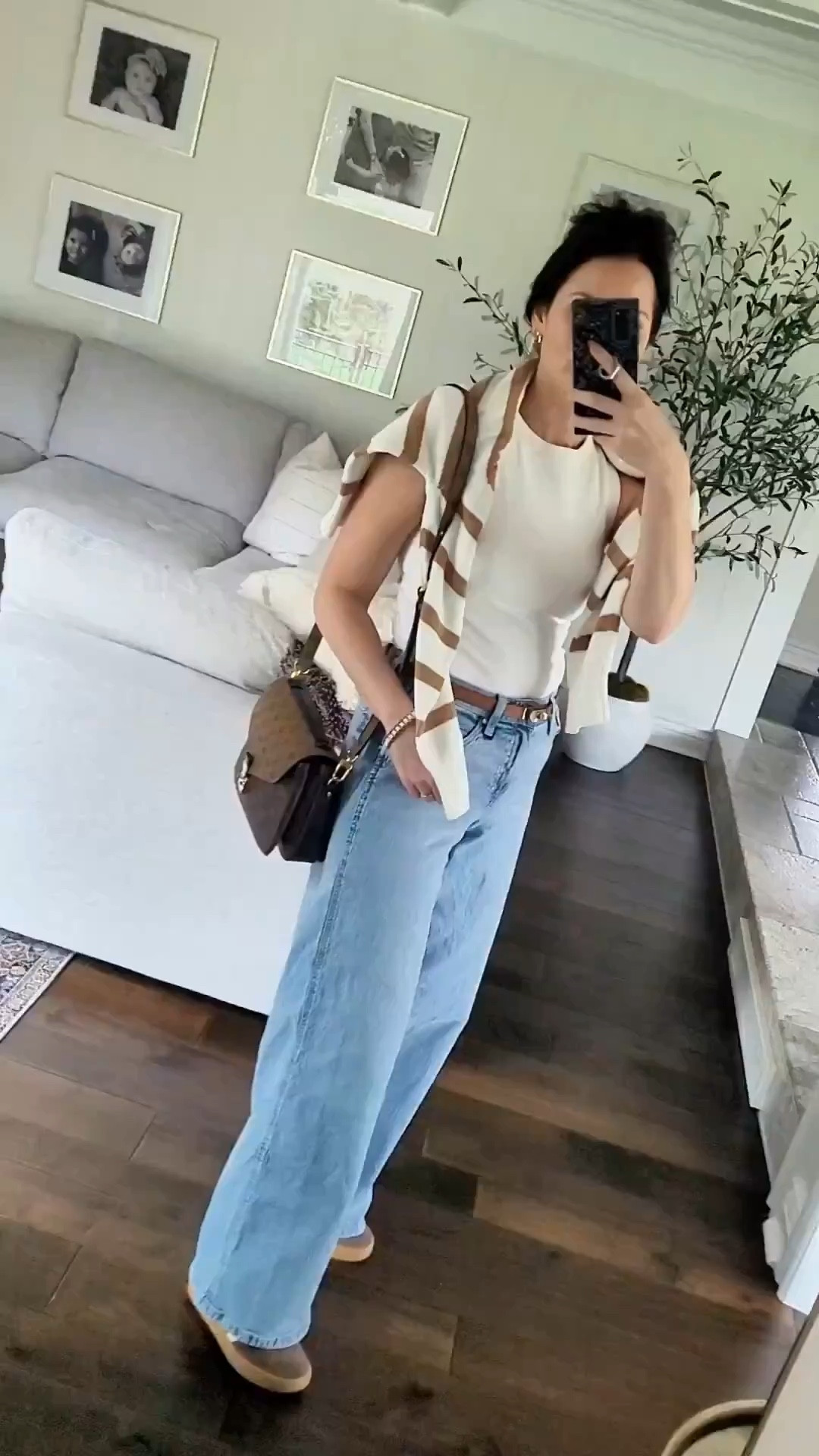 Spring outfits 2026 - affordable OOTD for moms on the go that want to look put together! I found the best wide strap tanks with built in bras, wide leg jeans, striped sweater and neutral sneakers!  Dainty jewelry, gold jewelry, handbag, adjustable belt - it’s all about the accessories! @Target @Ana Luisa @Vivrelle 

#LTKdayinmylife #LTKootd #LTKmomlife