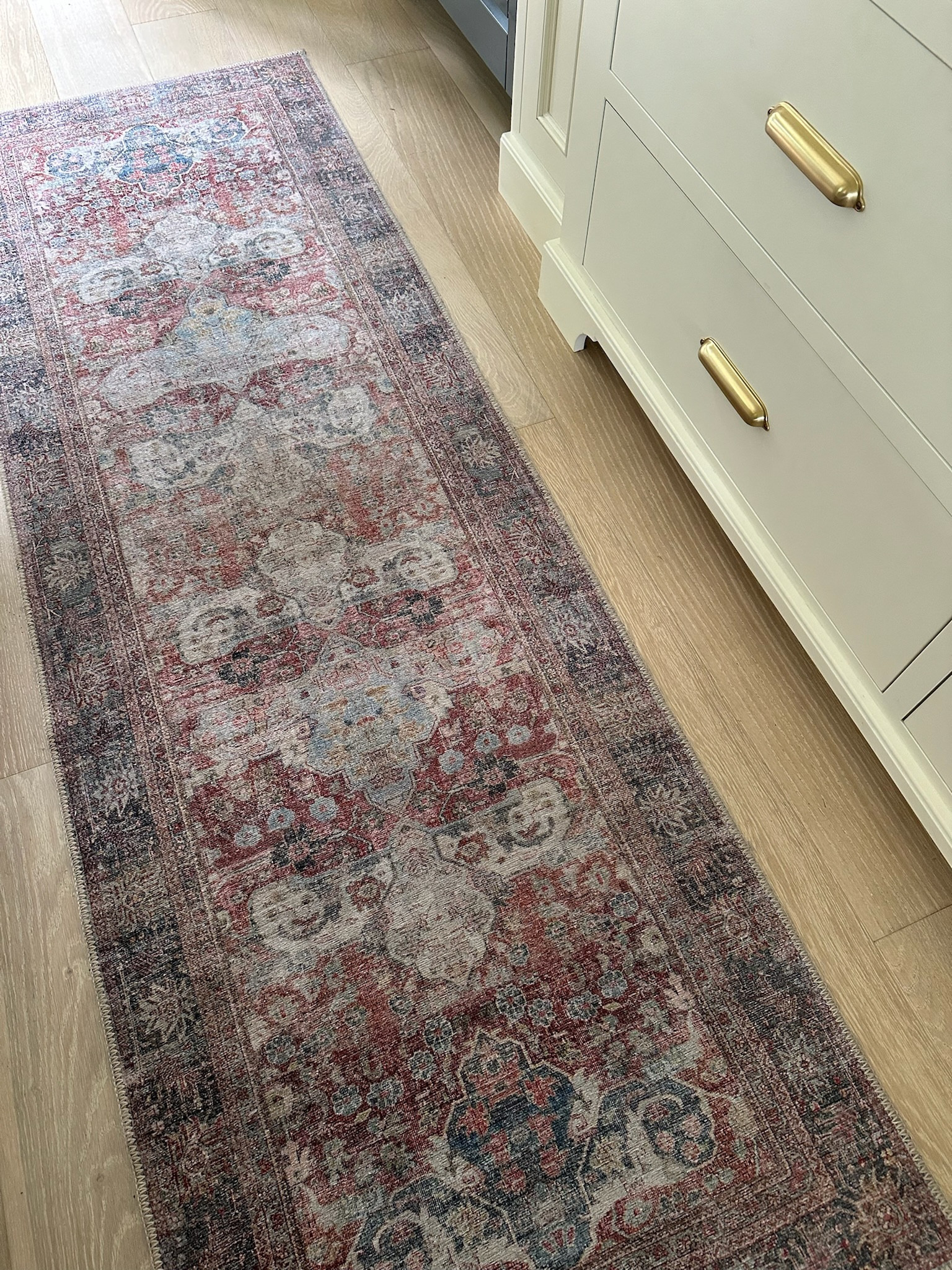 I ordered this Loloi rug on Amazon to try in the kitchen and a rug pad for it so it won’t slip. It is a beauty! It really adds an extra cozy fall mood plus with the nice reddish tones within the color palette it is not only wonderful for fall but also would be lovely through the holiday season, too! Mine is the “brick / multi” color. Picture is unedited to show the true color.

#LTKSaleAlert #LTKHome #LTKSeasonal