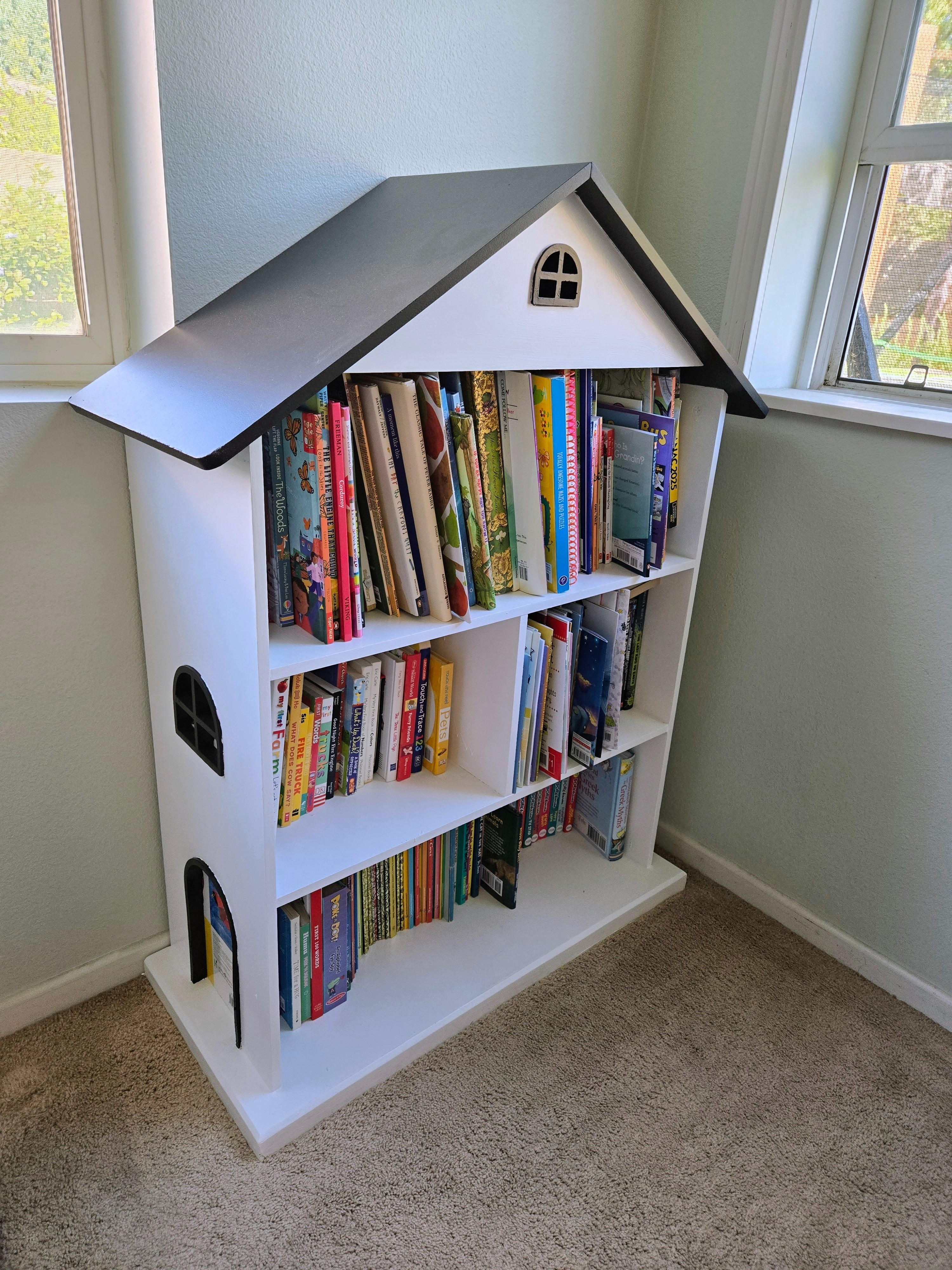 Kids dollhouse bookshelf,  repainted black to match farmhouse style

#LTKFamily #LTKKids #LTKHome