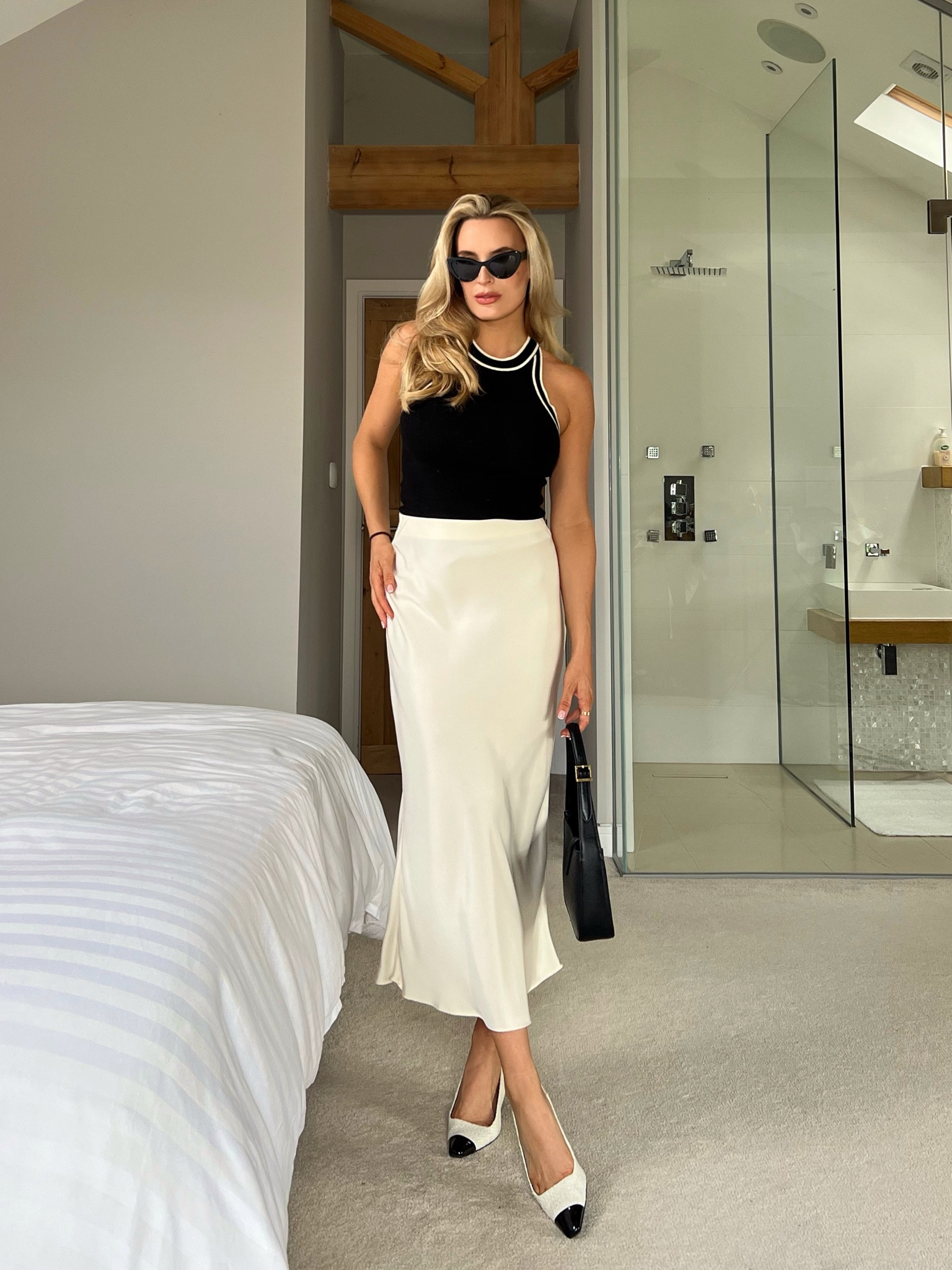 Monochrome classic styling: black racer tank, 2 tone slingbacks and some caterer sunglasses. Ultimate sophistication ✨



#LTKfindsunder50 #LTKstyletip #LTKSeasonal