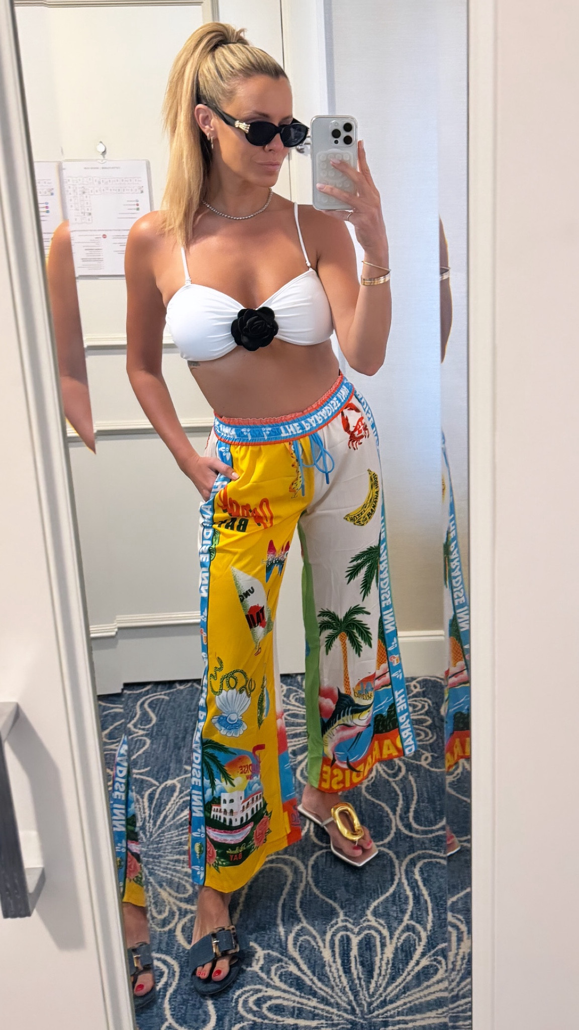 Off to the pool! Wearing this precious Amazon swimsuit (bikini bottoms are the opposite color way…black with white flower! And it’s under $30!) with the silk pants of this Alemais designer inspired set from Amazon that’s only $25! Which sandal would you wear? The denim pair from Scoop for Walmart or the metallic pair?? // sizing: swimsuit/medium, silk set/small 

#LTKfindsunder50 #LTKswim #LTKtravel