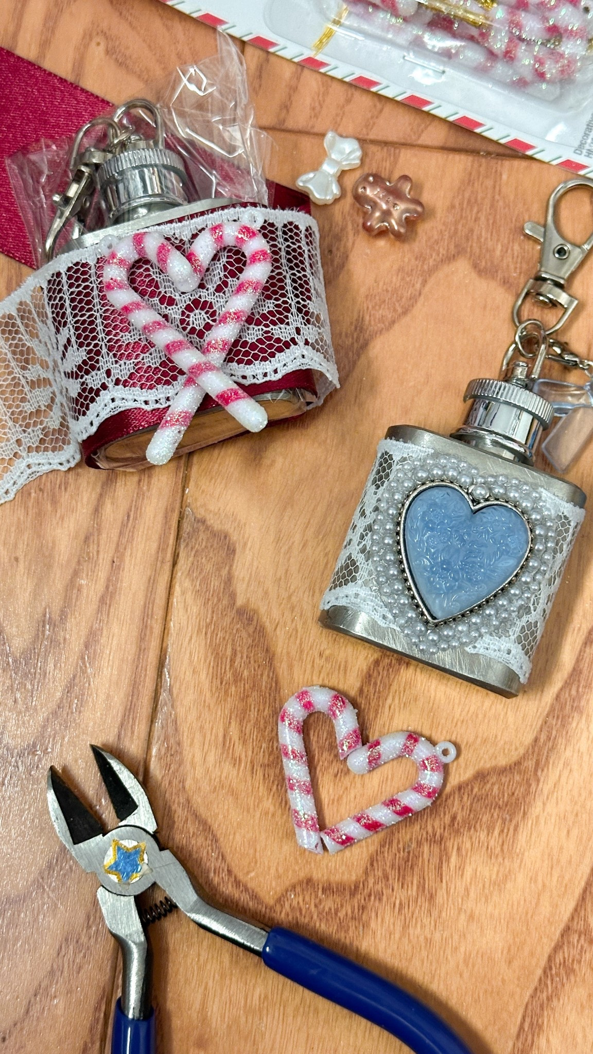 sneak preview of my next diy project 👀 figured since I have some keychain flasks left over I’d make another Sabrina carpenter inspired bag charm! One of my favorite celebrity christmas albums - good news the candy cane ornaments can be cut w/ pliers, I was worried I’d have to get out the dremel tool 😅 these would be such cute diy gifts! 🎁 

#LTKSeasonal #LTKGiftGuide #LTKHoliday