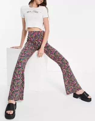 ASOS DESIGN kick flare pants in dark based floral | ASOS (Global)