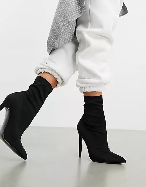 ASOS DESIGN Esmerelda high heeled sock boots in black | ASOS (Global)