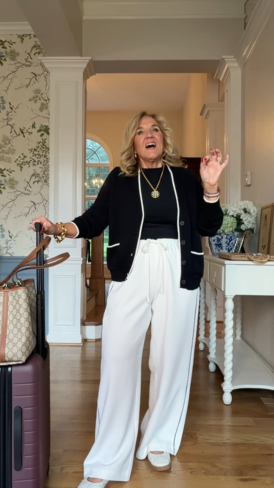 This is one of those effortless combinations you'll keep reaching for. This flowy wide-leg pants create an elegant silhouette that feels relaxed without looking oversized.

Fit note: I'm wearing medium regular, true-to-size fit, and it has a relaxed, wide-leg silhouette with a flattering drape that moves beautifully.

Style it with sneakers for travel days, loafers for errands or lunch, or dress it up with heels and layered jewelry for dinner or a casual event.

It's the perfect outfit for travel, brunch, shopping, casual office days, or anytime you want to look effortlessly put together without giving up comfort.

#LTKootd #LTKdayinmylife #LTKOver40