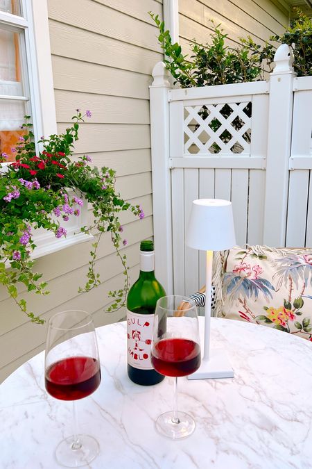 Our favorite, chilled wine, cordless, LED lamp, bistro table, flower box

#LTKunder50 #LTKFind #LTKhome