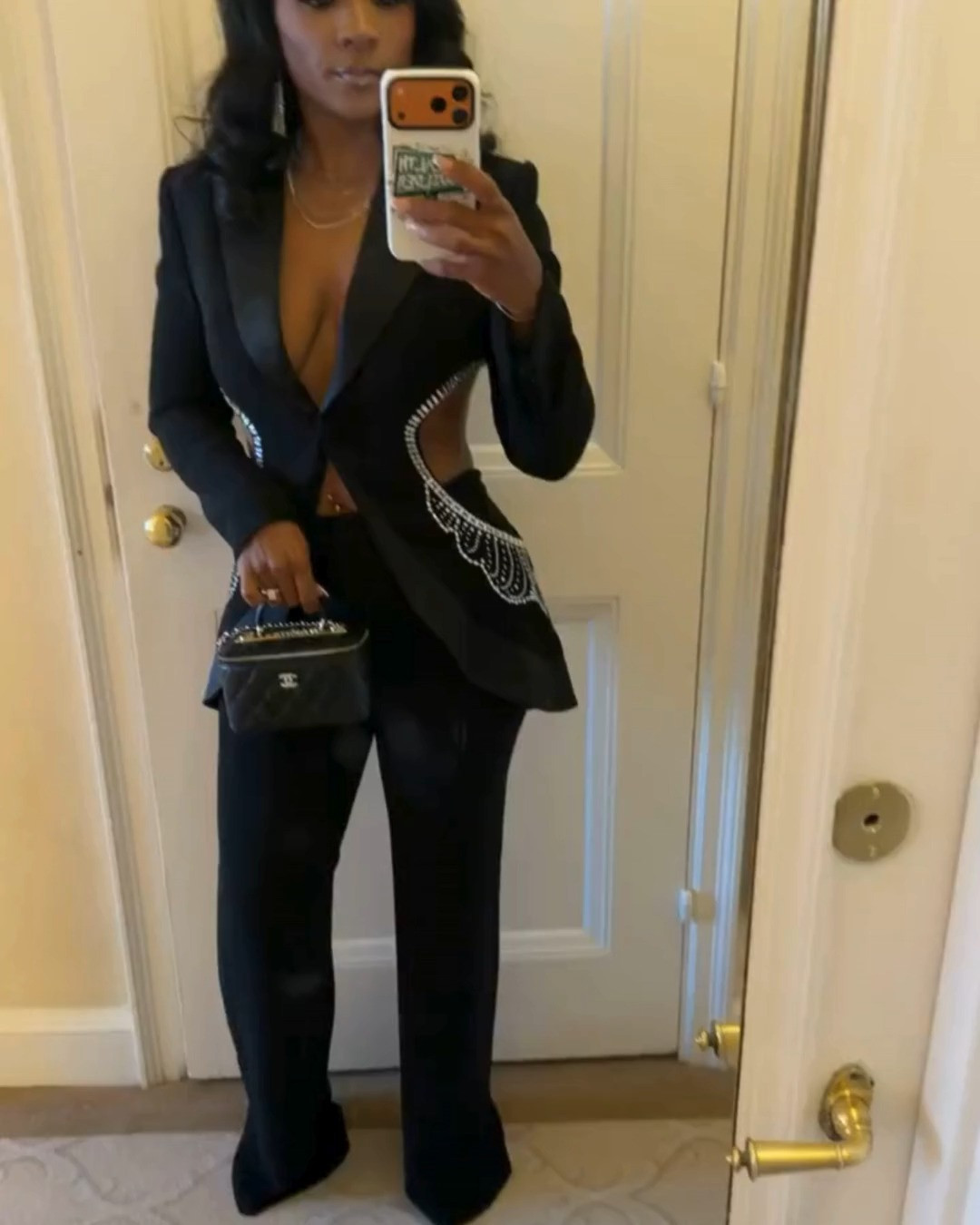 Love this crystal-embellished blazer set featuring a cut-out detail, long sleeves, a deep V neckline, and wide-leg pants. 

 #LTKootd