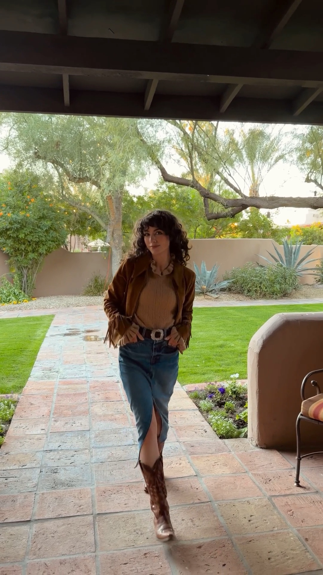 Easy fall/winter outfit combo: midi denim skirt, cowgirl boots, neutral sweater and fringe jacket 

#LTKSeasonal #LTKPetite