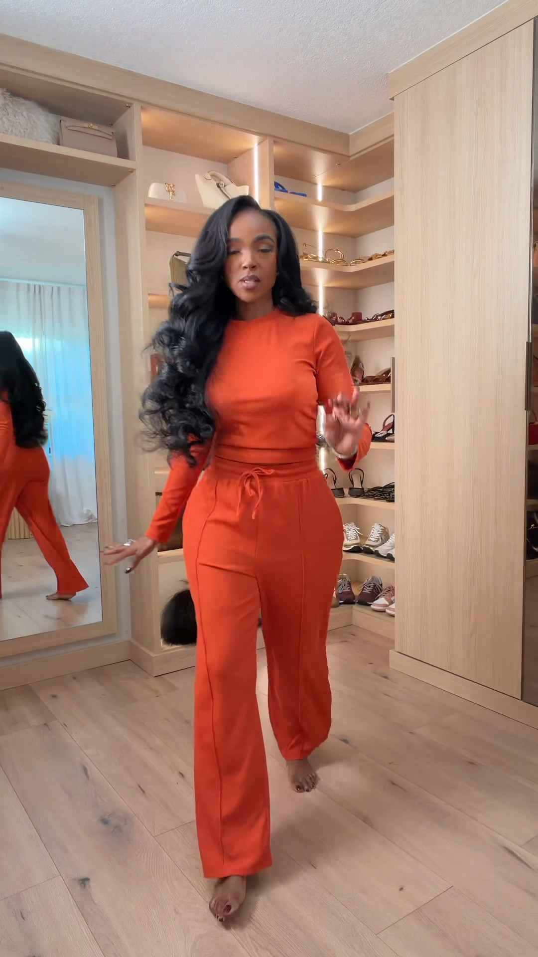 Effortless fall comfort 🍂  
This cozy orange lounge set is the ultimate mix of chic and relaxed — featuring a soft knit fabric, high neckline, and wide-leg fit that flatters every shape. Perfect for travel days, coffee runs, or lounging in style.  

📏 Sizing: Wearing size small; fits true to size with a relaxed stretch.  

fall loungewear set, cozy matching set, airport outfit ideas, comfy chic outfit, relaxed fall fashion for women.  

Follow me on Instagram and YouTube @kirasfashionfinds

#LTKHome #LTKPetite