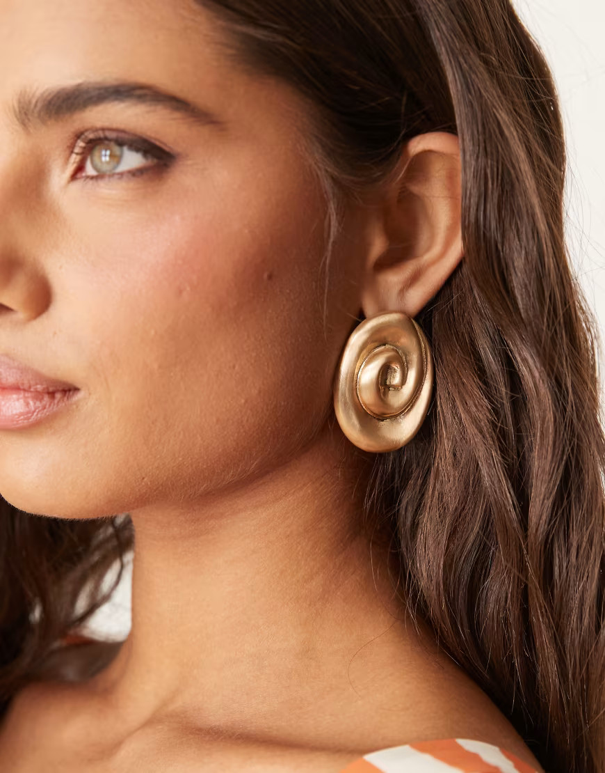 ASOS DESIGN stud earrings in swirl design in brushed gold tone | ASOS (Global)