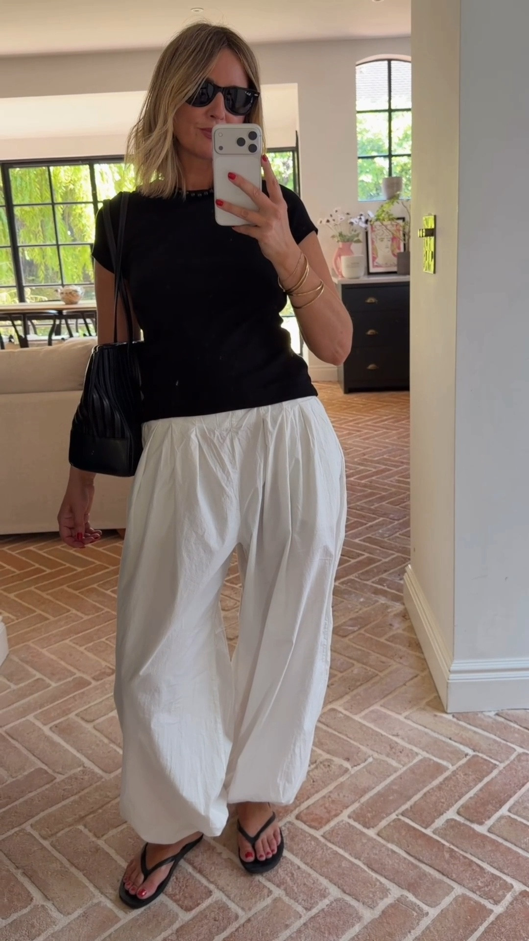 I’ve not reached for an oversized tee for a while now (unless it’s long sleeved) I’m all about the baby tee - I’ve been wearing this one on repeat 🖤 
Size M Tee | Size Small Bottoms 

The balloon trousers are a summer version of the soft ones I shared earlier this year

#LTKuk #LTKsummer #LTKstyletip