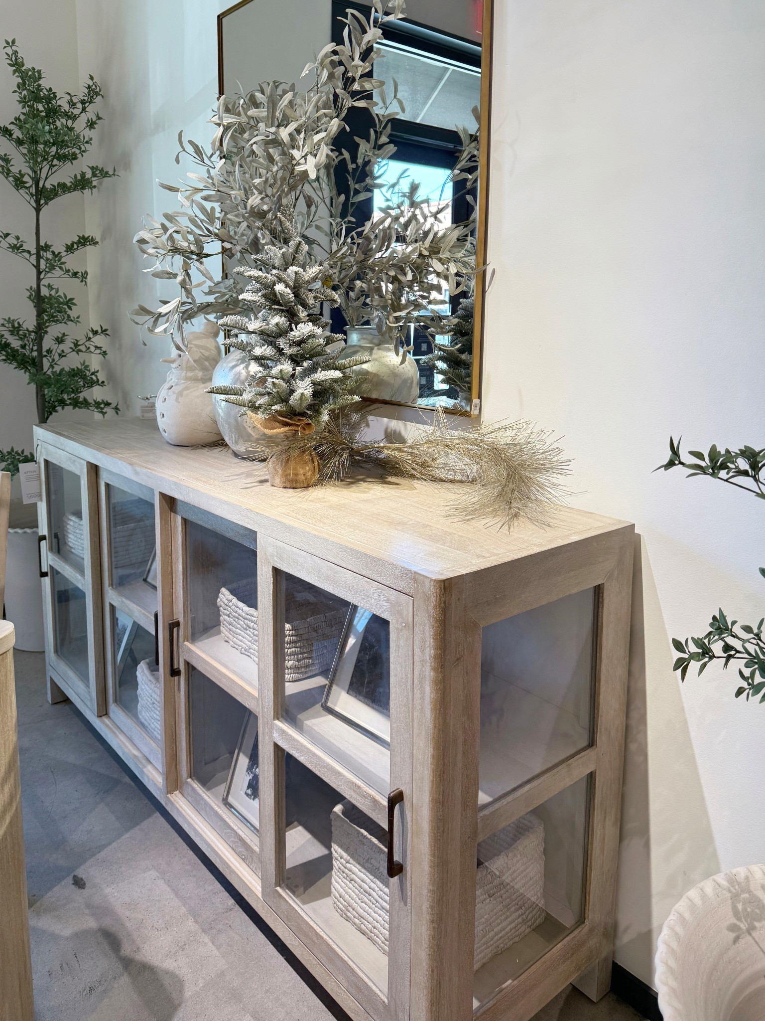 The Aptos Media Cabinet (72”) from Pottery Barn is such a beautiful neutral piece — the sandwashed mango wood finish and glass-front doors make it stylish and functional. 🤍 A bestseller for a reason! It works with so many styles: winter chic, modern farmhouse, coastal, and more. Perfect for living rooms, dining spaces, or as a statement sideboard. Linked this gorgeous piece + more neutral storage finds! ✨ #PotteryBarn #Sideboard #NeutralHomeDecor 

#LTKHome #LTKHoliday #LTKCyberWeek