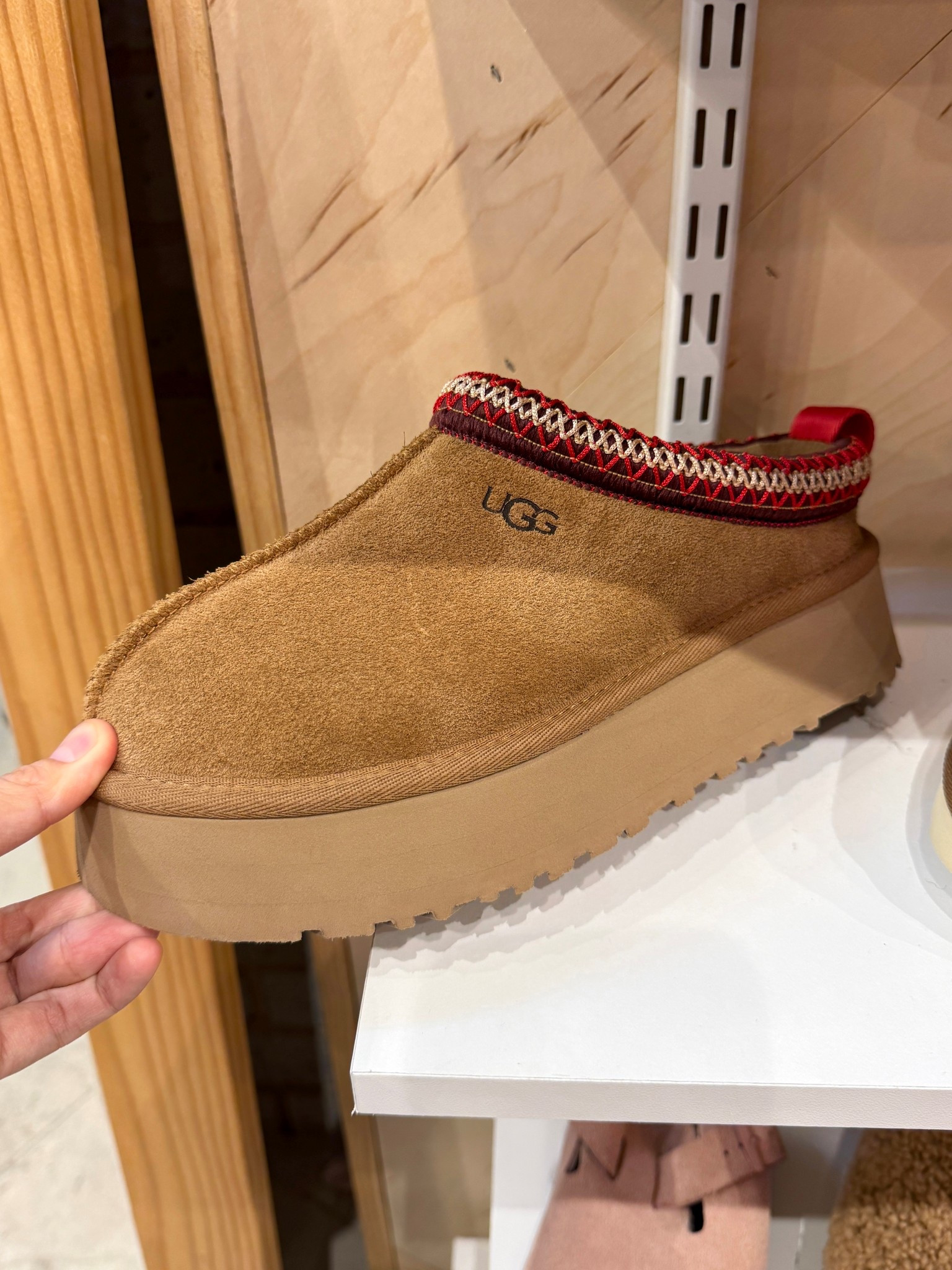 Holiday gift idea! 🎁✨ The UGG Tazz II Genuine Shearling Lined Platform Slipper in chestnut is a true winter classic. 🤎 Plush genuine shearling lines the inside for that cozy, cocooned feel, while the 1¾” platform sole adds a little lift without sacrificing comfort. The geo-patterned UGGbraid trim gives it an elevated, signature look—perfect for both lounging at home and quick outings. Comes in several colors too, making it such a great gift (or wishlist item 👀).
#GiftGuide #UGGS #WinterFashion

#LTKU #LTKGiftGuide #LTKHoliday