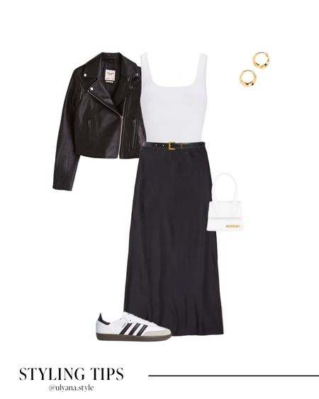 A black satin skirt paired with a white bodysuit, a leather jacket, adidas sambas sneakers, crossbody bag, and earrings makes a cute date night or fall outfit idea. 
.
.
.
.
.
.
#LTKSeasonal #LTKSale #LTKU #LTKfindsunder50 #LTKFind #LTKfindsunder100 #LTKHoliday #LTKHalloween #LTKstyletip #LTKworkwear #LTKtravel #LTKshoecrush #LTKitbag 

Fall outfits | fall fashion | fall shoes | skirt outfit | skirt and sneakers | Abercrombie skirt | black skirt outfit | long black skirt | black satin skirt | fall skirt | fall maxi skirt | fall midi skirt | long skirt | slip skirt | bodysuit outfit | fall jacket | leather jacket | black leather jacket | faux leather jacket | leather jacket outfit | moto jacket | fall sneakers | white sneakers | fall bags | designer bags | outfit inspo | outfit ideas | work outfit | work wear