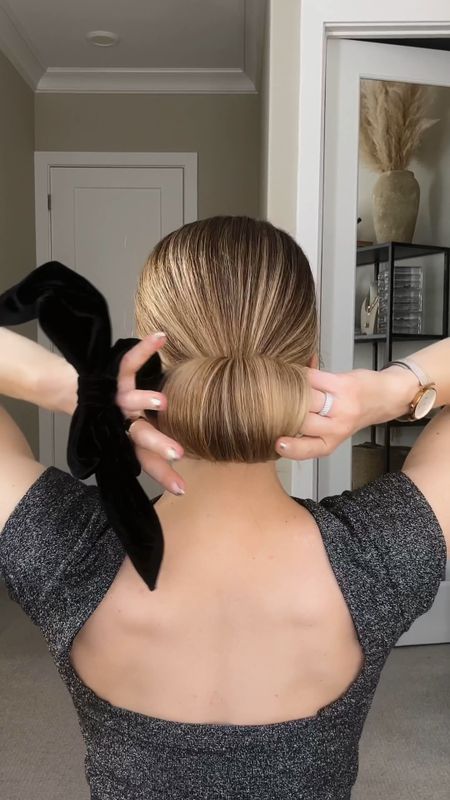 Not So Basic Low Bun - Holiday Edition 💁‍♀️

This low bun is chic, elegant, and most importantly, easy to achieve! Gather hair into a low ponytail and flip it upside down. Place hair tie around the base to create a mini bun. Twist one time. Drop the top of your ponytail over the mini bun and wrap the hair tie over it. Place a scrunchie, bow, or holiday accessory on top of the bun to make it festive ✨

#LTKSeasonal #LTKHoliday #LTKfindsunder50