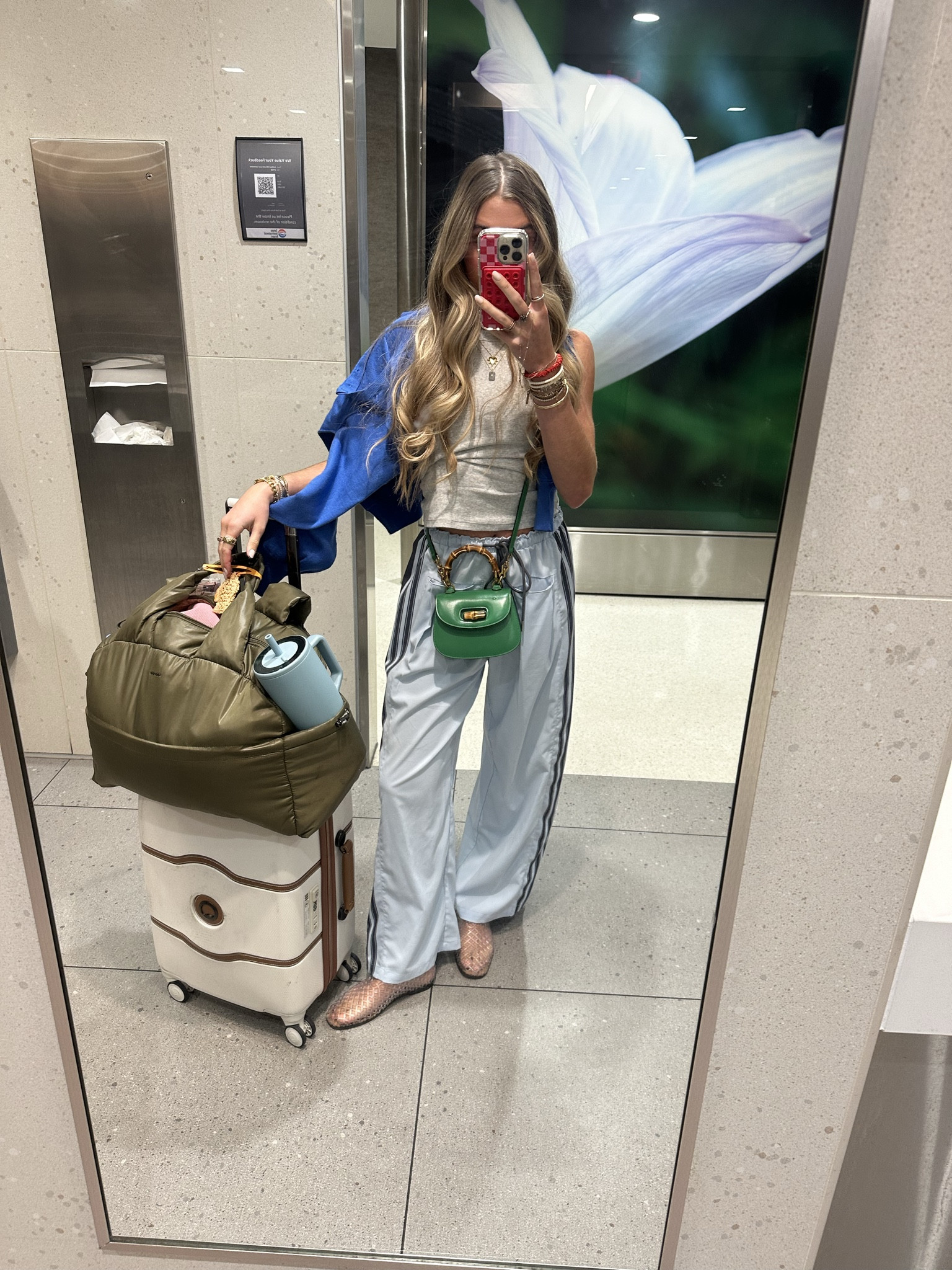 My airport travel outfit. My tank top has a built in bra size XS SUUKSESS Women Padded Cotton Ribbed Tank Tops 2025 High Neck Racerback Basic Tops. My pants are size XS Hongsui Women's Wide Leg Pants Drawstring High Rise Side Striped Slouchy Palazzo Pants with Pockets. My Caridgan is a free people look for less from Amazon size small  Esmeling Women Casual Button Front Sweater Henley Neck Long Sleeve Knitwear Solid Cropped Pullover Sweater. My infamous clear jelly slide sandals from Steve Madden. 

Airport outfit, travel outfit, comfortable outfit, amazon outfit, #outfit #fashion #style #ootd #ootn #outfitoftheday #fashionstyle  #outfitinspiration #outfitinspo #tryon #tryonhaul #lookbook #outfitideas #currentlywearing #styleinspo #outfitinspiration outfit, outfit of the day, outfit inspo, outfit ideas, styling, try on, fashion, affordable fashion. My electric picks code is SLOANE20!

#LTKItBag #LTKStyleTip #LTKTravel