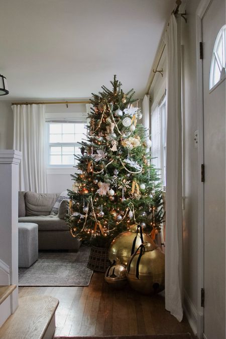 Neutral Christmas tree, gold tree, silver tree, jumbo jingle bells, large jingle bell, Kirkland’s find, holiday decor, Christmas decor, ornaments, velvet ribbon, wood bead garland  

#LTKhome #LTKHoliday #LTKSeasonal