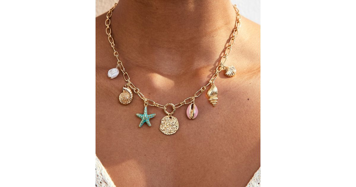 Gold Tone Shell Charm Necklace | New Look | New Look (UK)