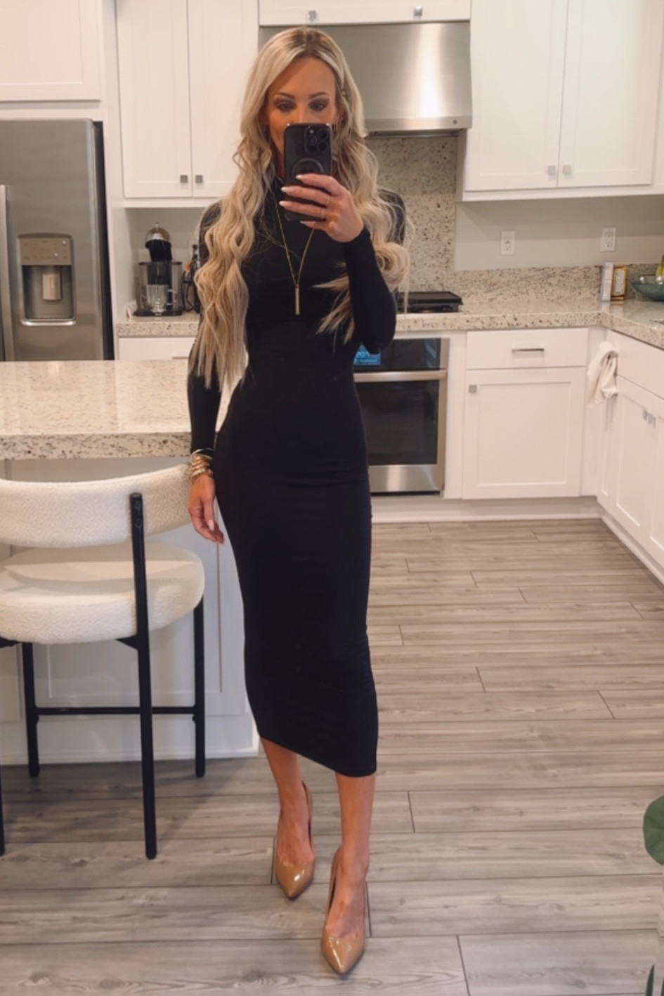 Long sleeve black body con dress  

#LTKOver40 #LTKFindsUnder100 #LTKParties