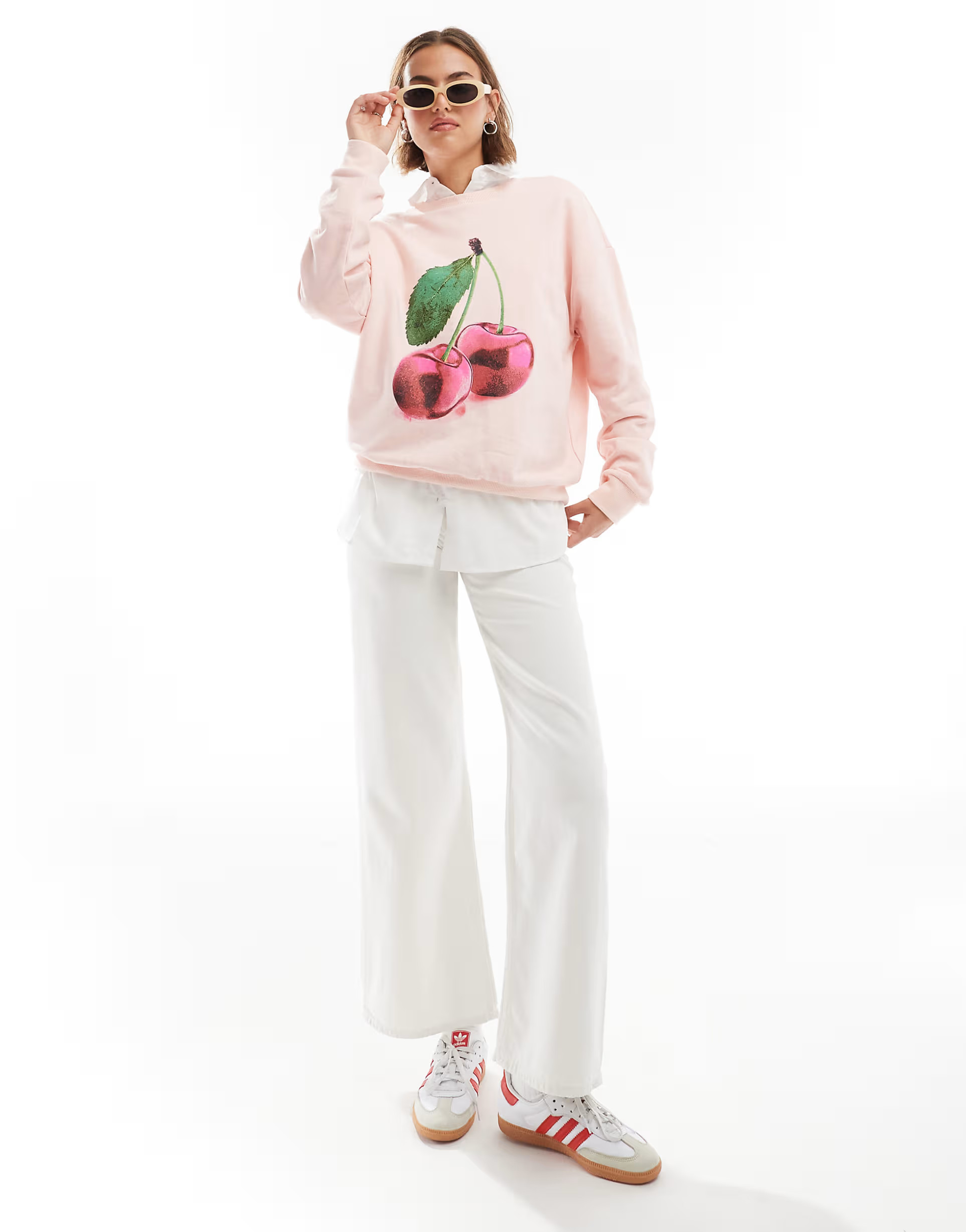 ASOS DESIGN oversized sweatshirt with cherry graphic in baby pink | ASOS | ASOS (Global)