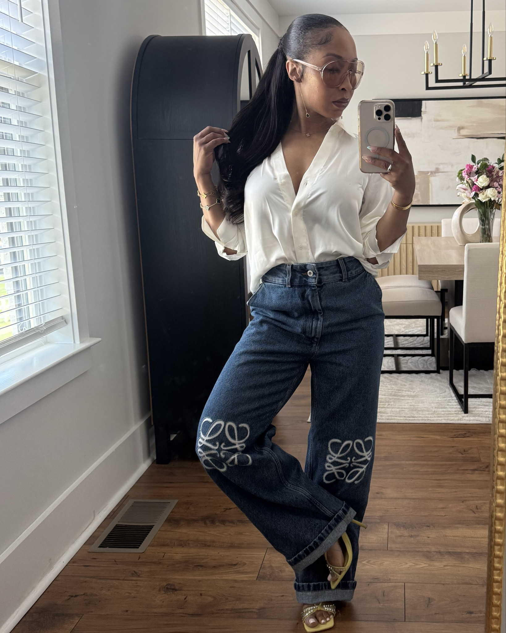 Summer classics. 
White blouse ✅
Designer jeans ✅
Spicy Heels ✅
Simple sunnies ✅

#LTKSummerEdit