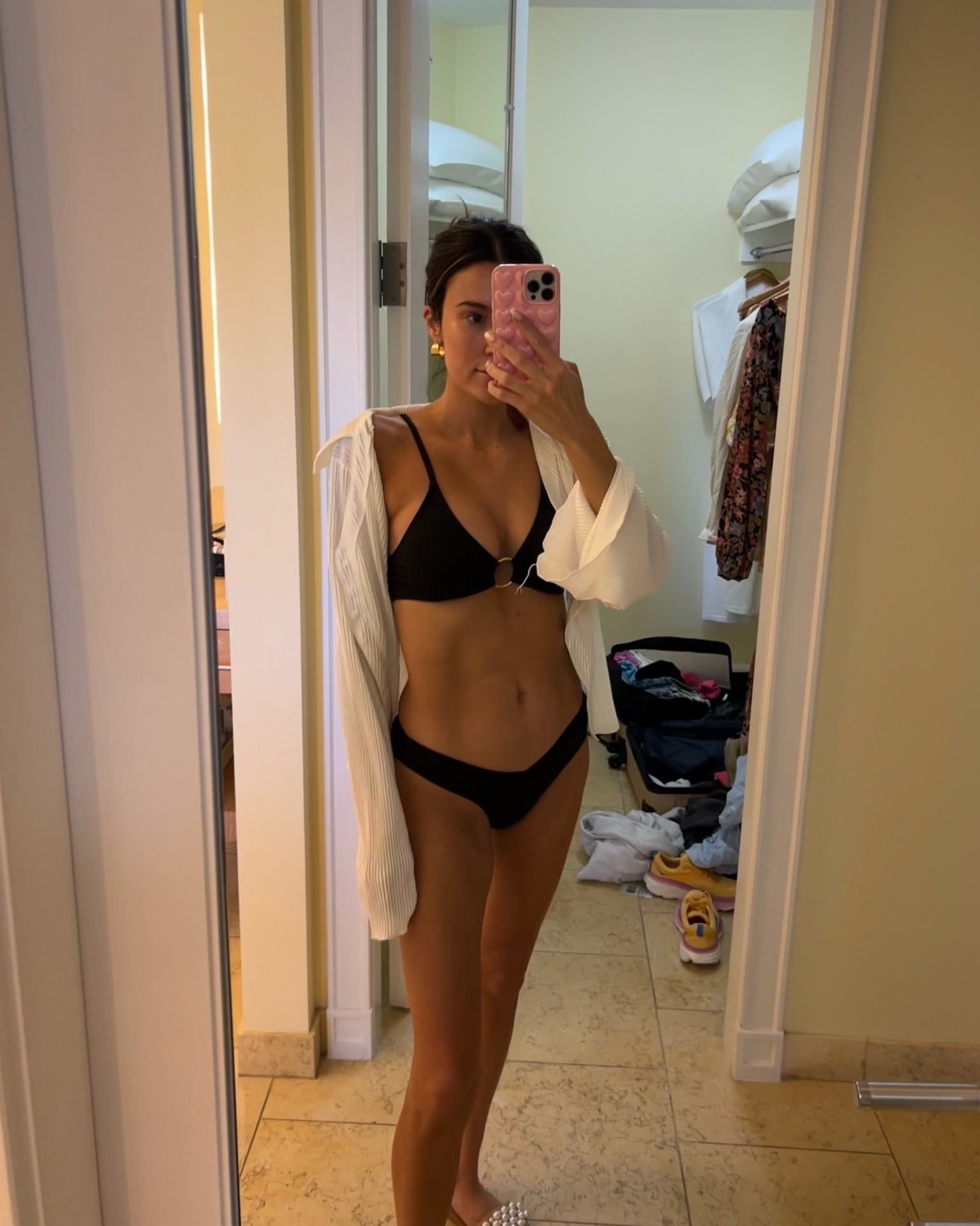 This black bikini was such a good find - under $30 🙌🏼 I’m wearing size medium. 

Resort wear; beach outfit; black bikini; black swimsuit; white coverup; pool outfit; travel look

#LTKtravel #LTKstyletip #LTKSeasonal