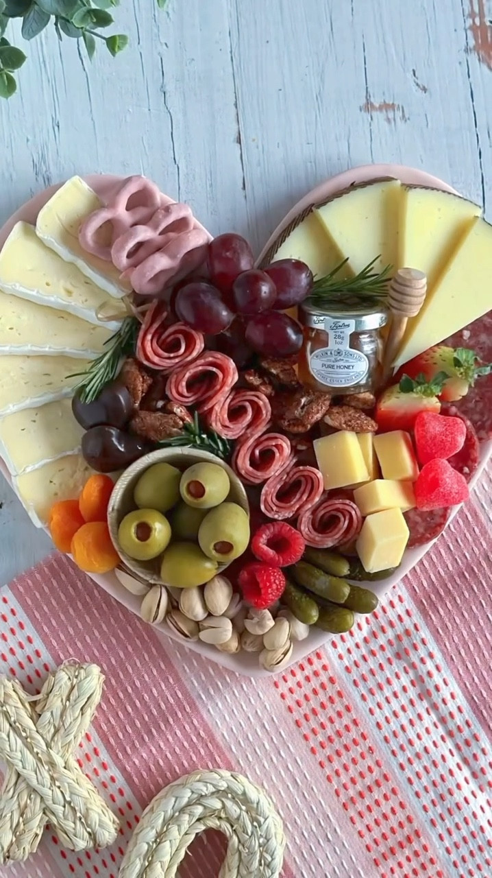 SAVE for Valentine’s Day Inspo! ❤️

These adorable heart-shaped melamine plates from @target make the perfect base for your cheese and charcuterie creations.

✨ Styling Tip: Place cheeses along the edges to create a uniform outline, then fill in the center with your favorite meats, fruits, and sweet treats. Think berries, chocolates, and nuts for that romantic flair!

Tag a friend who’d love this idea, and don’t forget to save for your #valentinesday celebrations! 💕

#fyp #charcuterieandthings #charcuterieboard #cheeseboard #foodstyling #diy #charcuterietips 
# ValentinesDayCharcuterie #CharcuterieInspo #HeartShapedPlate #ValentineIdeas #targetfinds