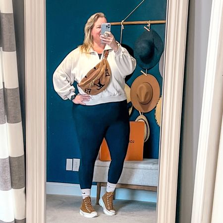 A one piece jumpsuit is never a bad idea. Cooler days call for a quarter zip but easily exchange for a graphic tee on warmer days. I added my platform sneakers and Sherpa cross body bag. 

#LTKcurves #LTKFind #LTKshoecrush