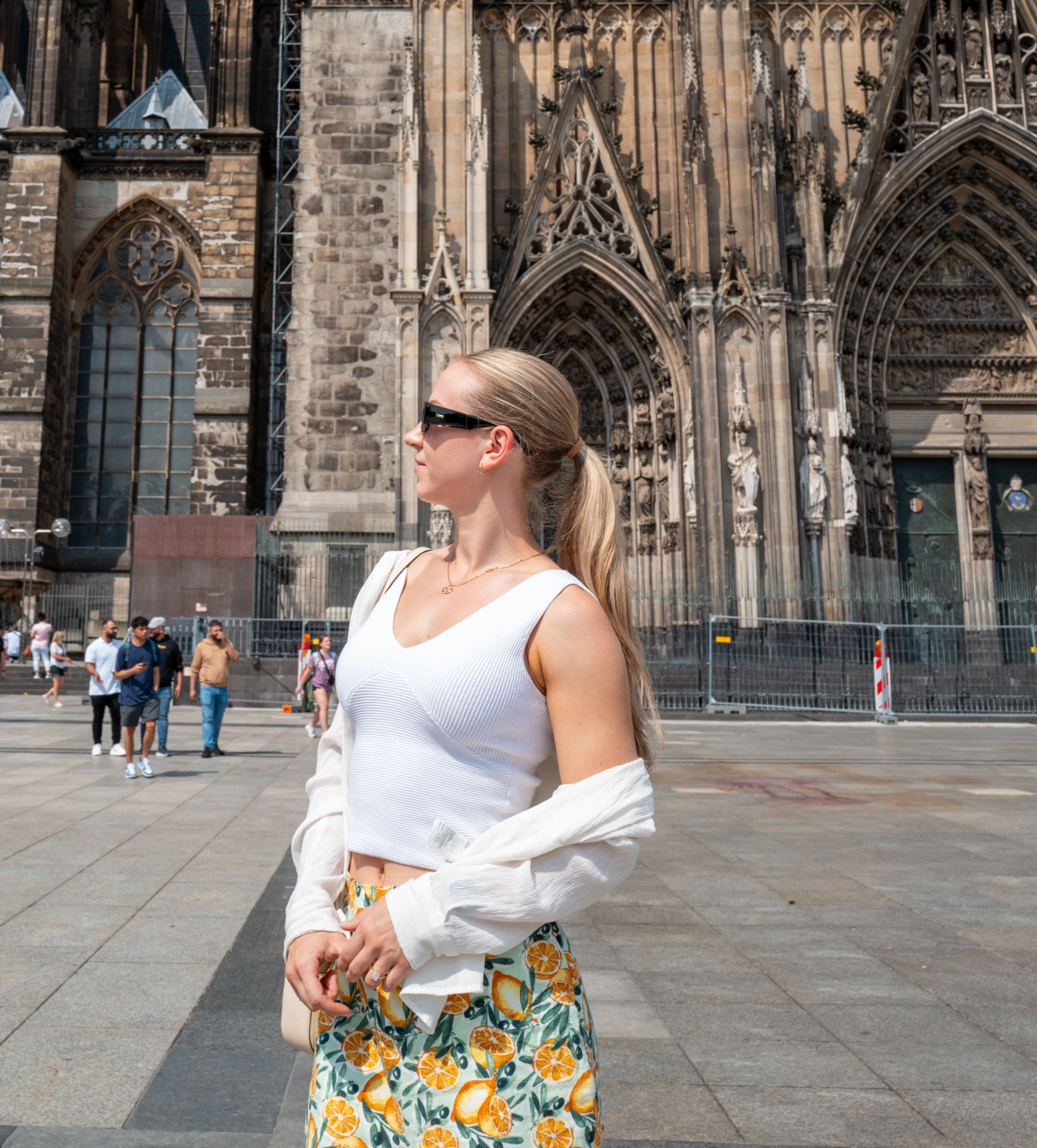 Skirt is small (exact skirt linked), tops are similar (also small)