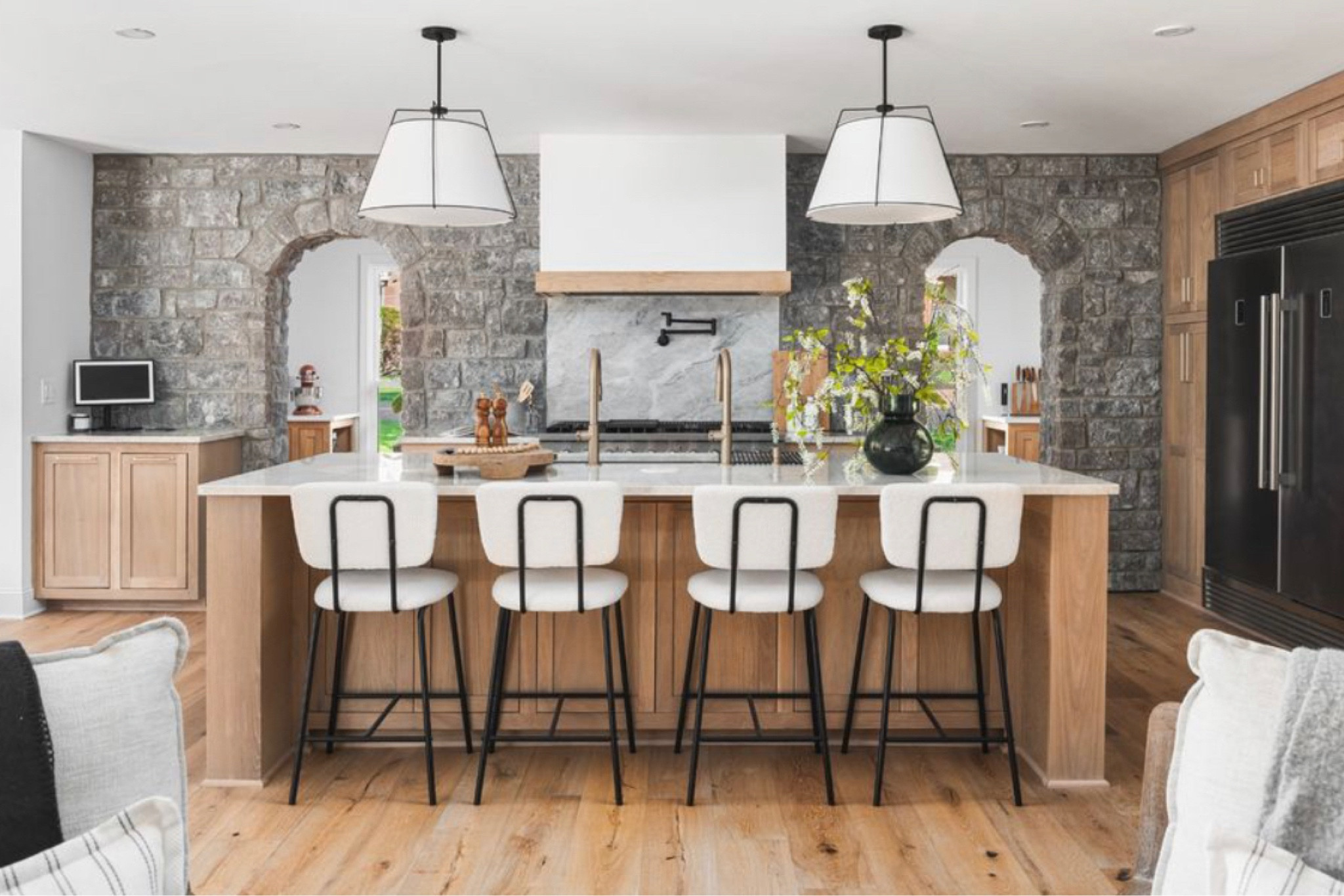 Shop our kitchen! These are custom white oak kitchen cabinets with Taj Mahal quartzite countertops. The wall color is Sherwin Williams pure white. The backsplash stone is gray Tennessee limestone. I absolutely love these island lights, for an 8’ island these are perfect sizing! 
The 4 bar stools are a set and are a STEAL! 
For professional grade appliances this 48” fridge and 48” gas range are very budget friendly! 
I love the large sink with double faucets! We also have double 18” dishwashers that are panel ready Zline! I would recommend doing 2 24” however, the 18” are just to small. I love the pot filler and all the things about our kitchen! 

#LTKU #LTKHome #LTKStyleTip