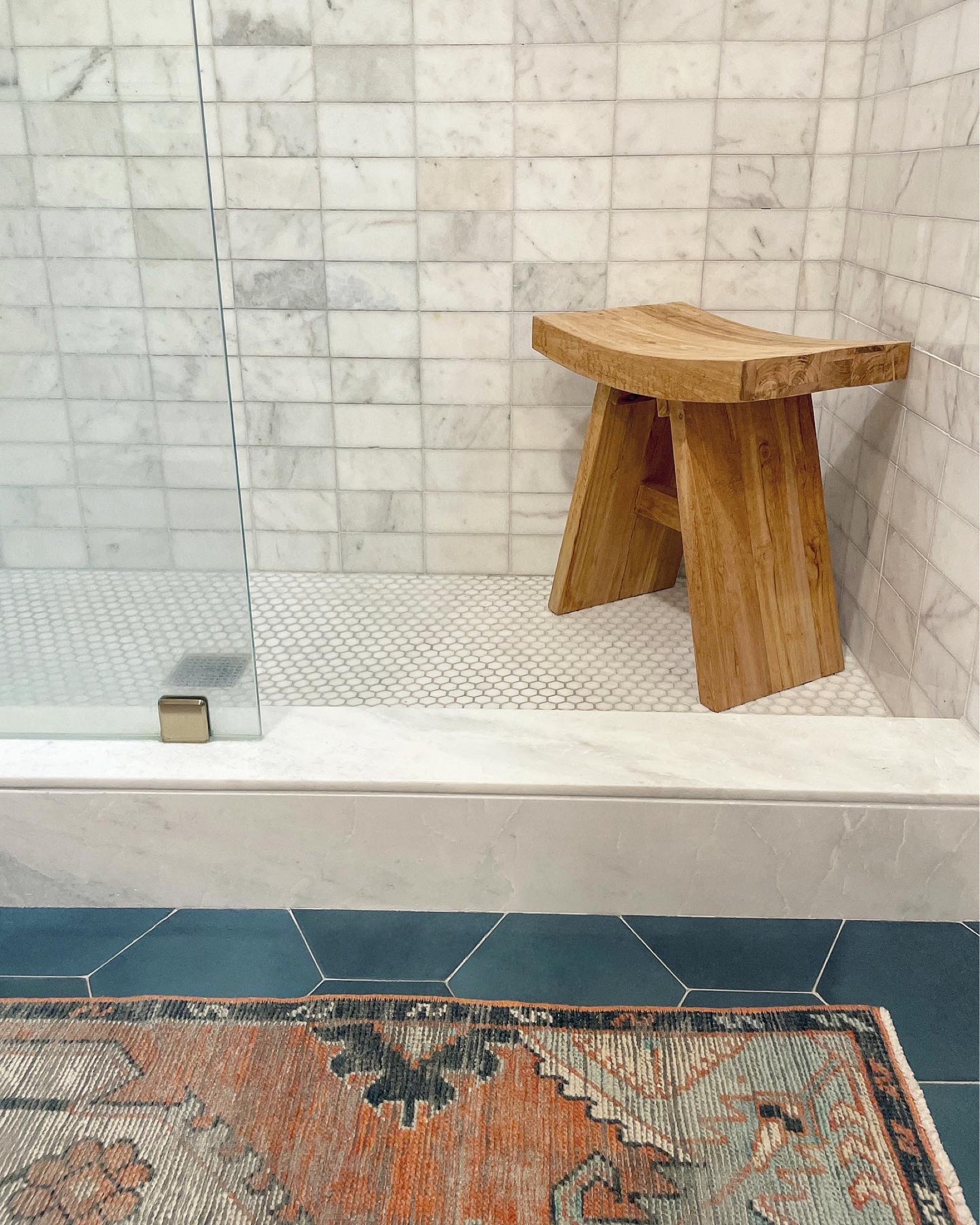 A contemporary stack of classic Carrara 🤌🏻 truly the best of both worlds! Funky modern Austin bathroom remodel by @holleyhouseco

#LTKhome #LTKstyletip #LTKtravel