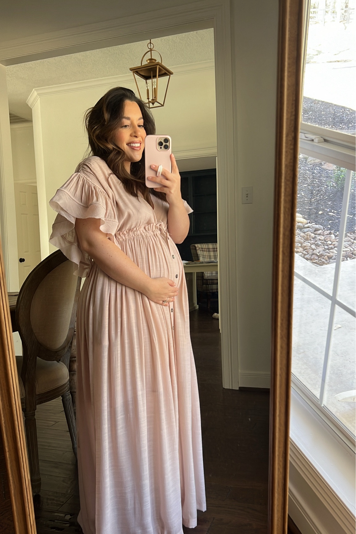 Pink Blush Maternity try on! 30% off with code PREZ30 now!! This dress is beautiful for maternity photos, pregnancy announcement photos, baby shower and any event you have during pregnancy! I would size down if you can runs large! I’m wearing a size small. Comes in 5 different colors

Details
A solid short sleeve maternity maxi dress with a deep v-neckline, ruffle accent sleeves, button down closure in front and tie accent in back. Skirt is partially lined. Pocketed.
Content + Care
100% Polyester
Hand Wash Cold, No Bleach, Lay Flat to Dry, Cool Iron, If Needed
Import

#LTKstyletip #LTKbump #LTKSpringSale