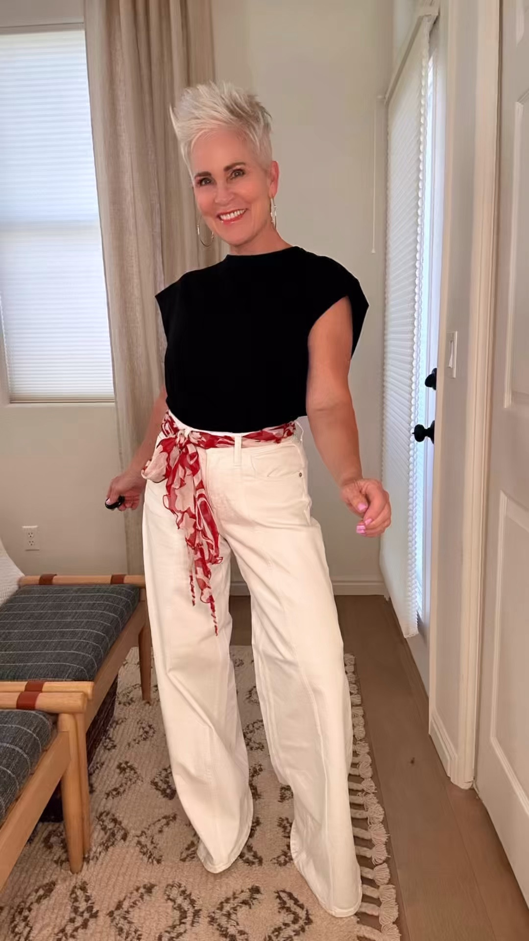 AFFORDABLE spring tops here, paired with white flairs and a colorful scarf belt. 

#LTKootd #LTKgrwm #LTKOver40