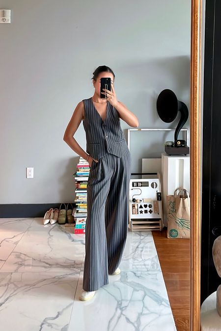 Chic and gorgeous! The pants drape beautifully and the vest is perfectly oversized. 

For sizing reference, I’m 5 ft 105 pounds and wearing a size XS in the vest and Petite 0 in the pants. The vest has a perfectly relaxed shape and the pants can be worn with sneakers and heels    