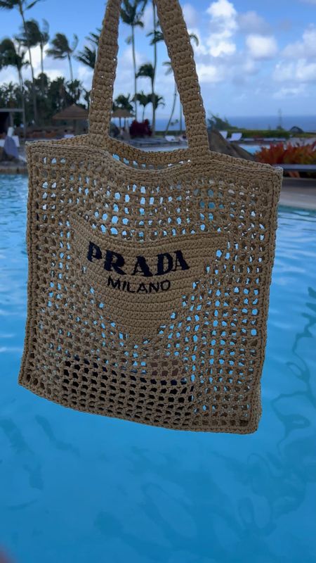 Prada Raffia bag 🏖️ The most perfect and cutest beach bag for your next tropical vacation. Resort Wear. 

#LTKtravel #LTKSeasonal #LTKswim