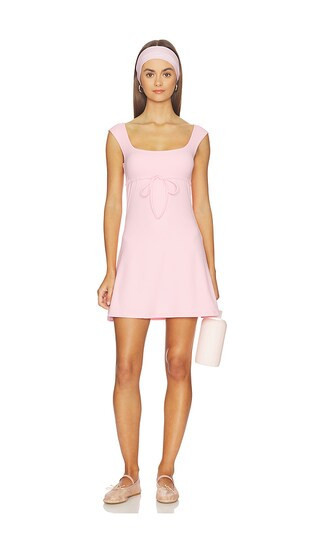 Astoria Babydoll Tie Dress in Pink. - size XS | Revolve Clothing (Global)