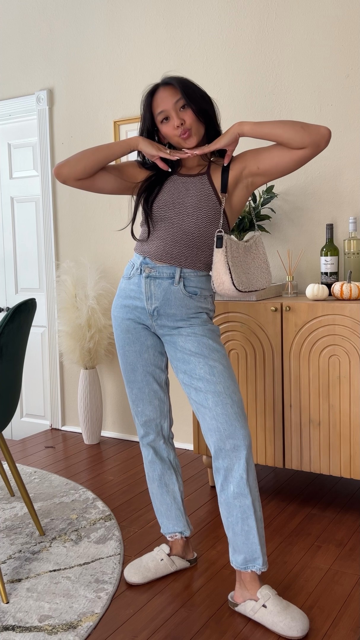 Fall transition outfit: sweater tank, Abercrombie jeans, clogs outfit, Boston clogs, transitional style, fall outfit inspo, easy outfits, halter top, straight leg jeans, meir, ameirylife 

#LTKU #LTKshoecrush #LTKSeasonal