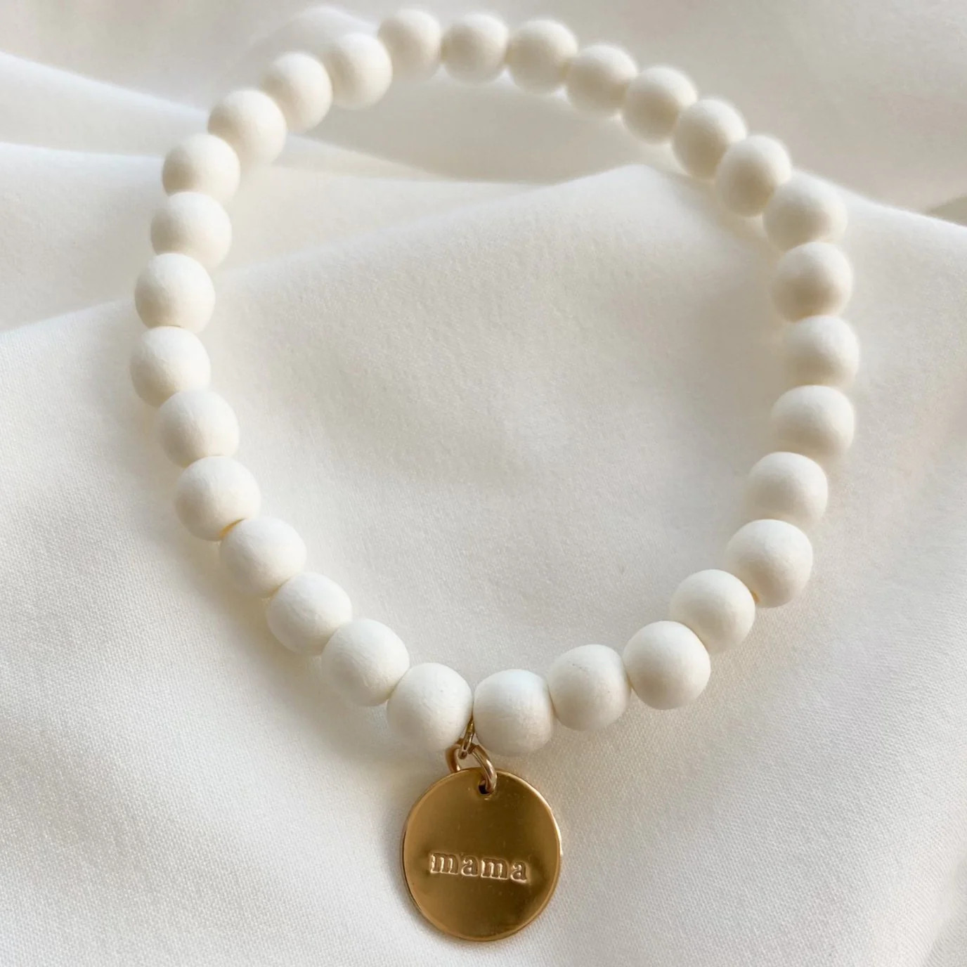 mama stamped bracelet | delicate cream | Reef rain aria