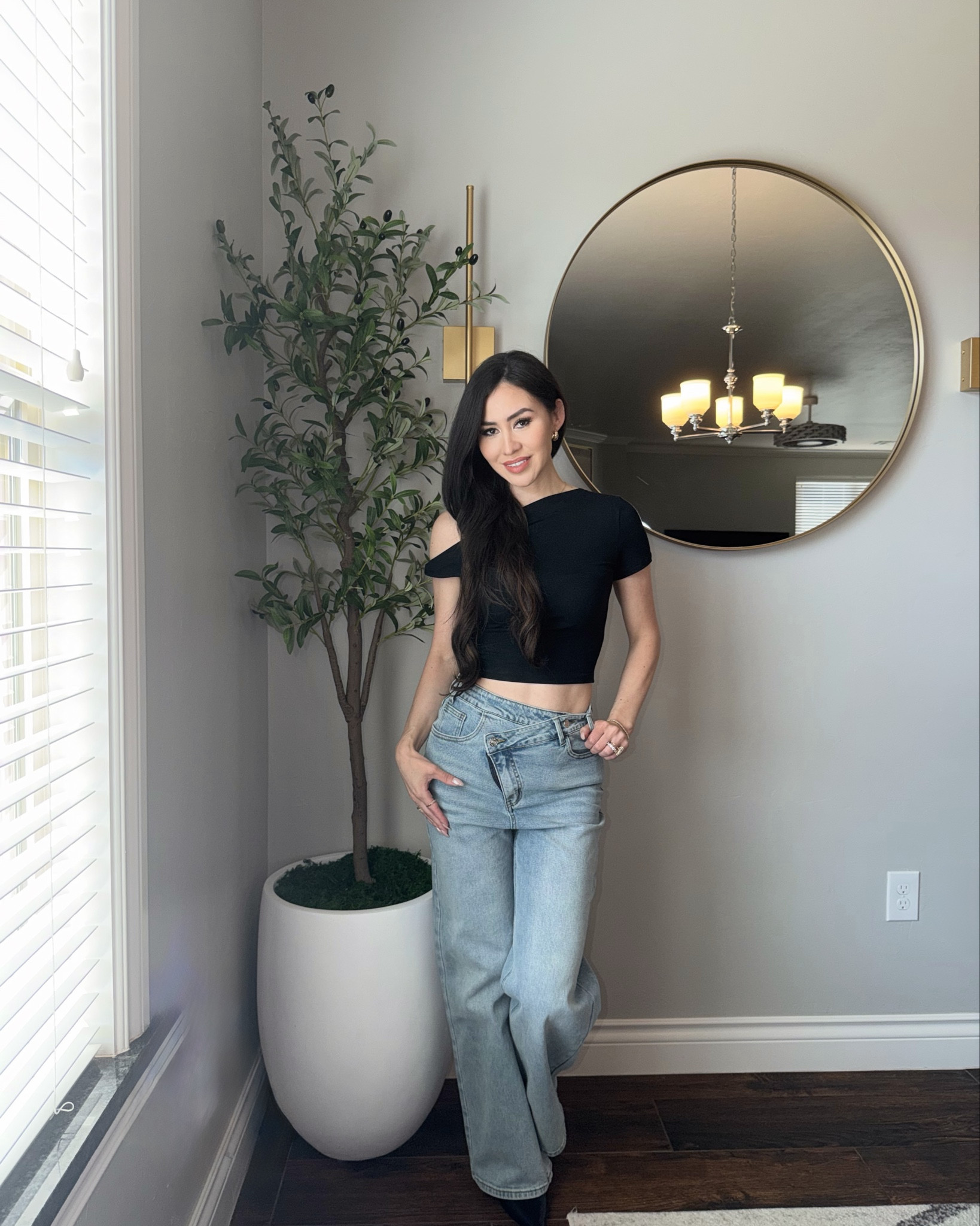 Asymentric neck sleeveless shirt and  asymmetric waisted jeans by commense 

#LTKU #LTKStyleTip
