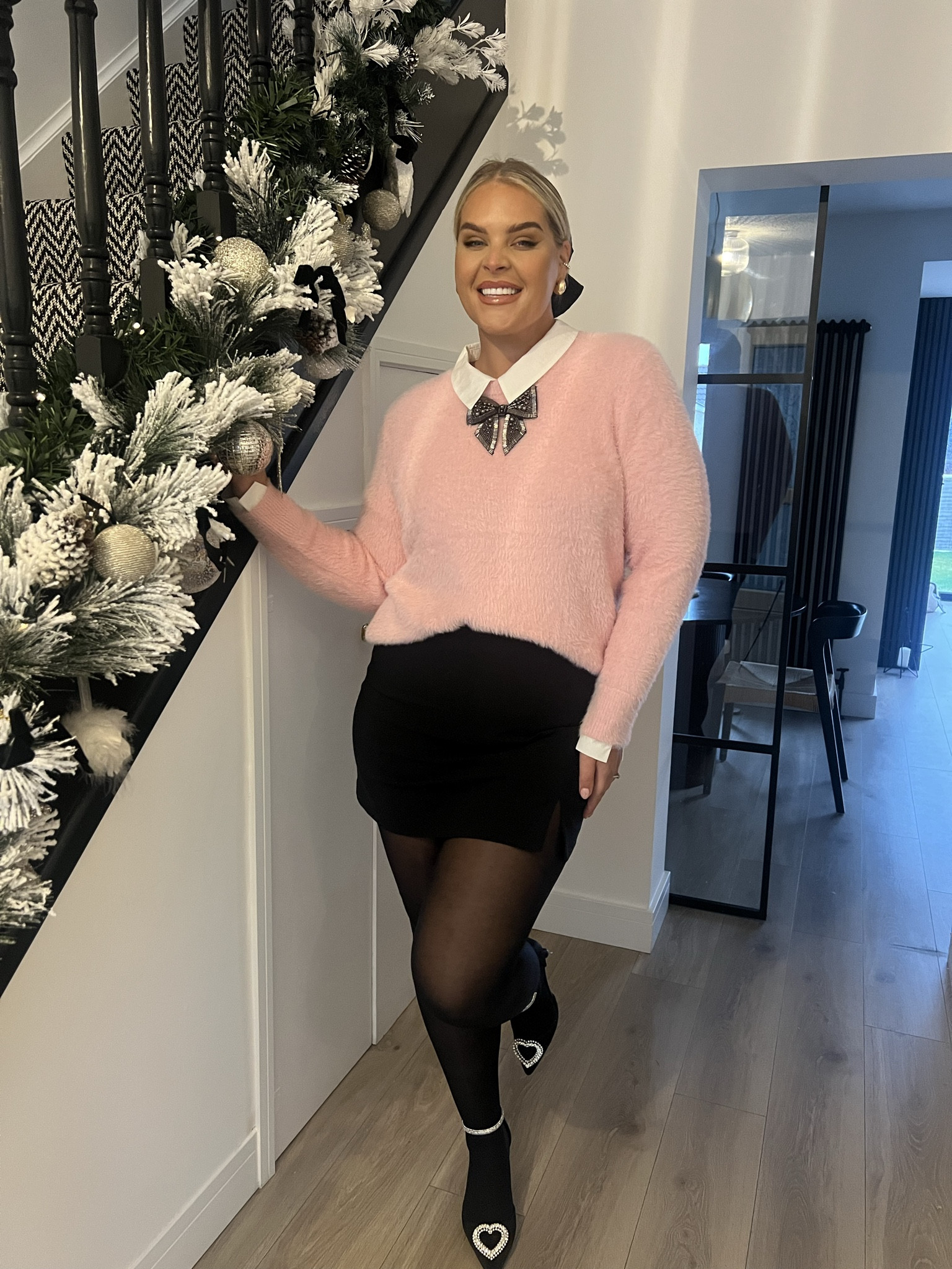 Christmas Day outfit. Fluffy jumper. Pink jumper. Cosy jumper. Black mini skirt. Sheer tights. Heart heels. Black hair bow. Winter fashion. Christmas fashion. Holiday outfit. Christmas style. Christmas night out. River island jumper. ASOS skirt. #ltkgift

#LTKmidsize #LTKHoliday #LTKstyletip