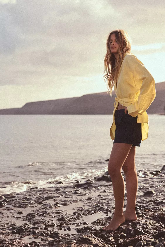 Oversized linen shirt. Lapel collar and long sleeves with cuffs and dropped shoulders. Tie detail... | Zara US