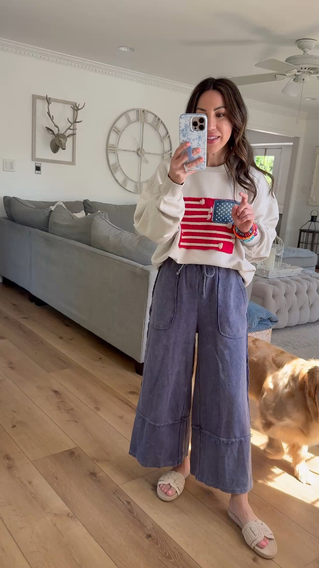 Small black sweatshirt. Small wide leg pants. Sandals TTS.

#LTKOver40 #LTKPetite