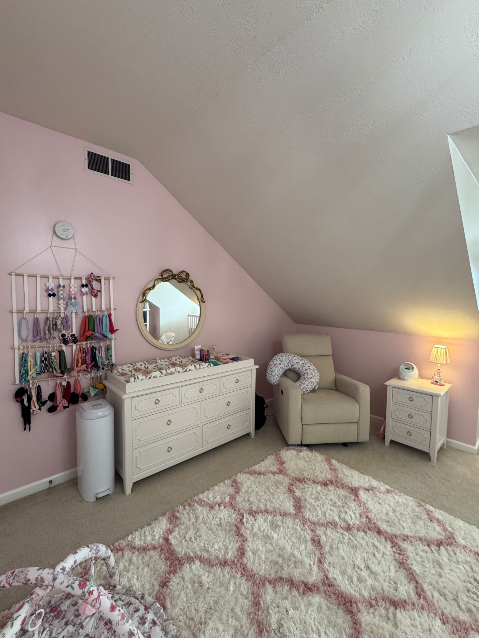 Glider, dresser and changing station, bow mirror and side table in Zoey’s nursery 💕

Princess nursery, pink nursery, baby girl nursery, bow nursery, pottery barn kids, rugs USA, nuture& glider

#LTKHome #LTKBaby
