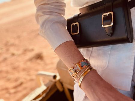 Detail shot. Baxter picked this Zebra Hermes bracelet for me on the way to Africa - which was so sweet! It will always remind me of our trip to Africa🧡
I got this ODP belt bag years ago and it is so beautifully made and really elevates any look. 

#LTKFind #LTKtravel #LTKeurope