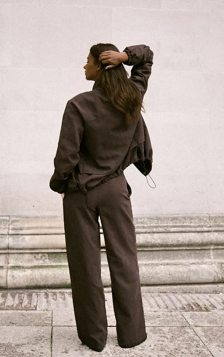 Trousers | Brown Peach Skin Straight Leg Trouser | PrettyLittleThing | PrettyLittleThing US