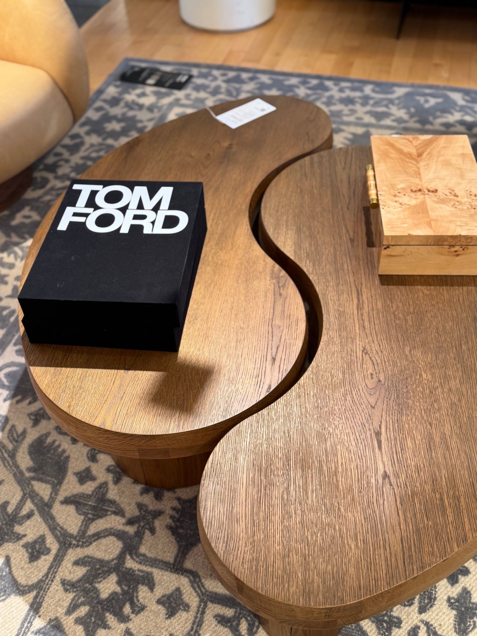 Gorgeous split coffee table. My favorite coffee table decor, books stacked with decorative bowl or candle on top for a high end look 