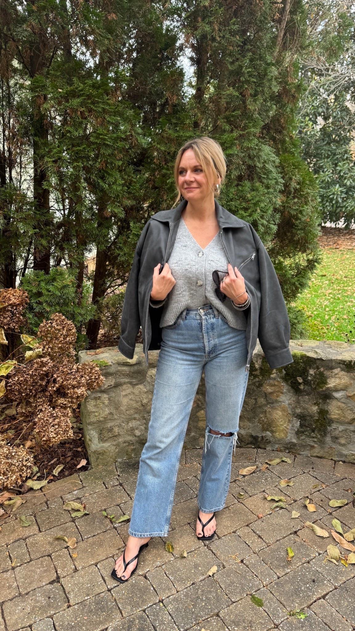 This outfit is a perfect example of how an oversized leather jacket can feel effortless and wearable for everyday life. The soft gray sweater keeps the look relaxed and approachable, while light-wash denim adds balance and prevents the outfit from feeling heavy. Draping the leather jacket over the shoulders instantly elevates the basics without overpowering them. Finishing the look with simple heels adds just enough polish to make it feel intentional, not dressed up. It’s the kind of outfit that works for errands, lunch meetings, or casual plans. Easy, comfortable, and pulled together without feeling over styled.

#LTKgrwm #LTKootd #LTKdayinmylife