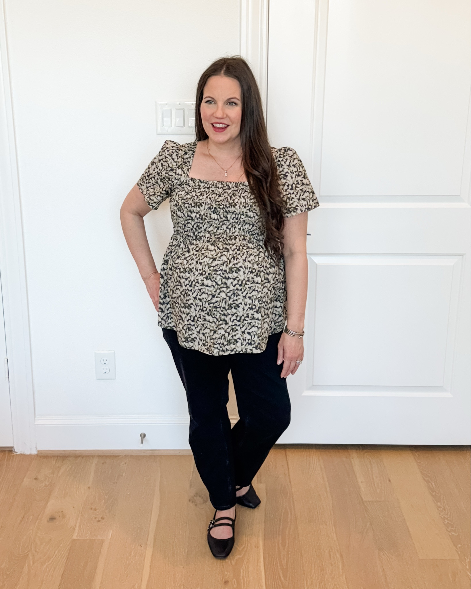 This bump-friendly spring outfit is an easy maternity outfit that works for everyday pregnancy style. The maternity smocked short sleeve top functions as a polished workwear babydoll top and pairs effortlessly with straight leg black jeans, truly the best maternity jeans for comfort.

Styled with black Mary Jane flats, this outfit creates a timeless dressy casual style that works for both everyday wear and maternity workwear.


#LTKPetite #LTKBump #LTKSeasonal