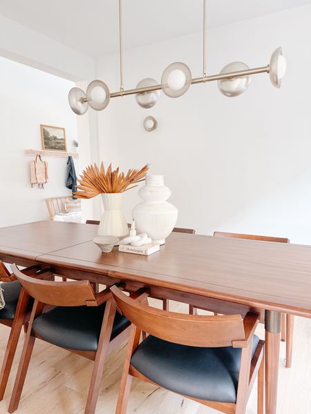 Love the simplicity and textures of this centerpiece 

Organic Modern decor / white vase / modern table / modern chandelier/ modern wall sconce / 

#LTKHome #LTKSaleAlert